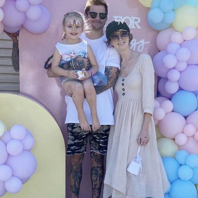 Gold Coast bridal hairdresser Megy Gough with husband Justin and daughter Harper at a Gold Coast Girls in Business fundraiser a few months ago.