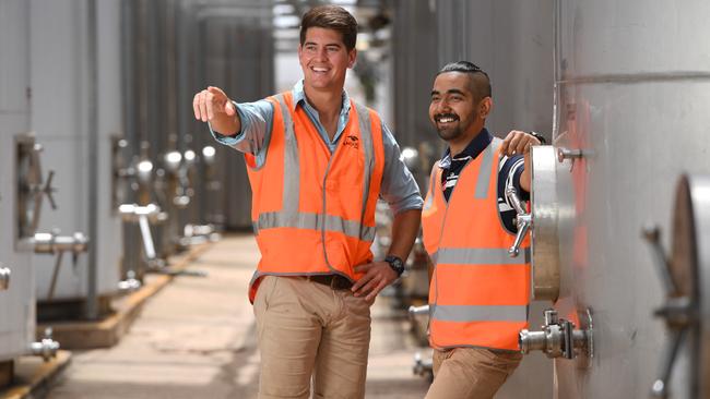 Winemakers Armand Lacomme and Prakeet Mehra of Riverland Vintners among the wine vats in Monash. Picture: Naomi Jellicoe