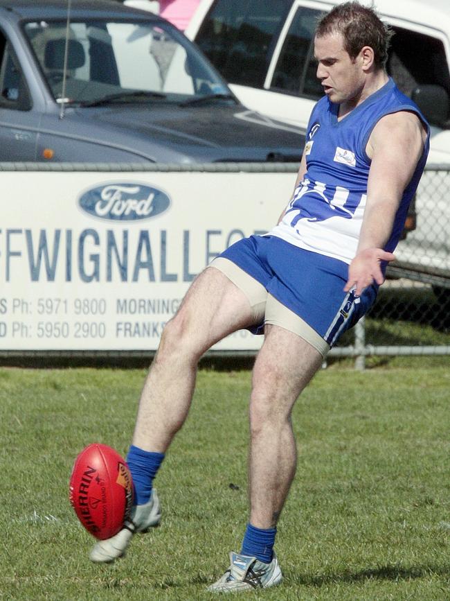 Brad Wakeling takes a kick for Langy.