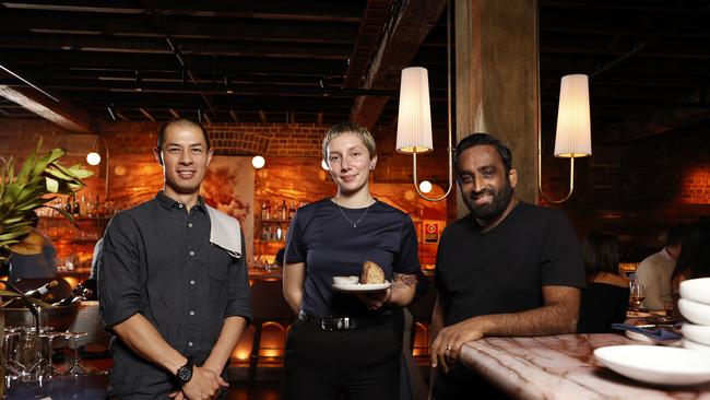 Justin Newton owner of Grana restaurant in the Sydney CBD with manager Claire Ivanovski and 24-hour economy commissioner Michael Rodrigues. Picture: Jonathan Ng