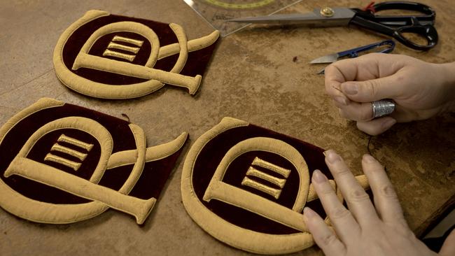 New CR III cyphers are cut out and prepared to be sewn onto ceremonial dress ahead of the Kings coronation, at Kashket &amp; Partners in London, England. (Photo by Dan Kitwood/Getty Images)