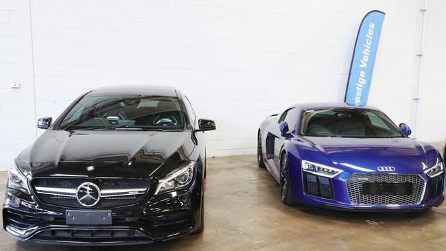 Melissa Caddicks luxury cars — an Audi Quattro R8 V10 and a Mercedes AMG Turbo 4 Matic CLA 45. Picture: John Grainger