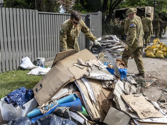 The Army cleans up in flood-affected areas of Queensland. Picture: NewsWire / Sarah Marshall