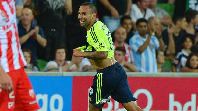 Archie Thompson celebrates his winning goal in 2012.