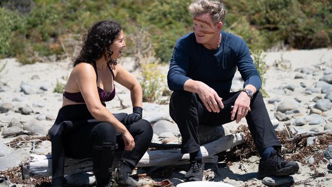 Gordon Ramsay, with symbolic lines painted on his face during a traditional Welcome to Country ceremony, discusses the bounty of fresh seafood in Tasmania with diver and chef Analiese Gregory. Picture: NATIONAL GEOGRAPHIC/JUSTIN MANDEL