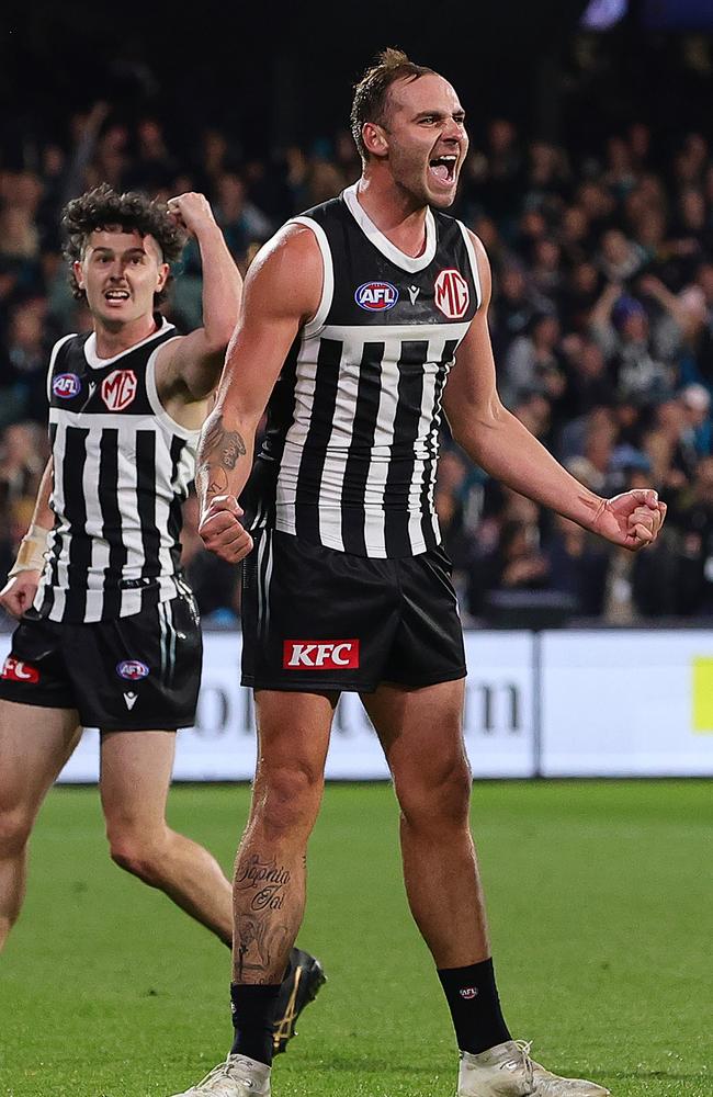 Jeremy Finlayson celebrates kicking one of his three goals. Picture: Sarah Reed/AFL Photos via Getty Images.