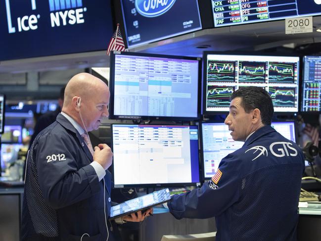 Traders on the floor of the NYSE on Wall Street. Picture: AP