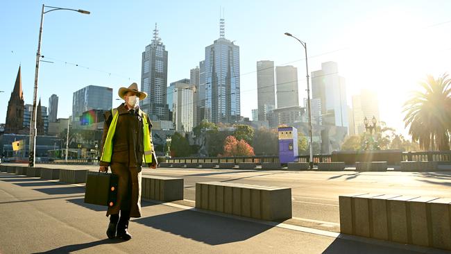 A lone pedestrian on Princes Bridge in Melbourne on Monday. Picture: Getty Images