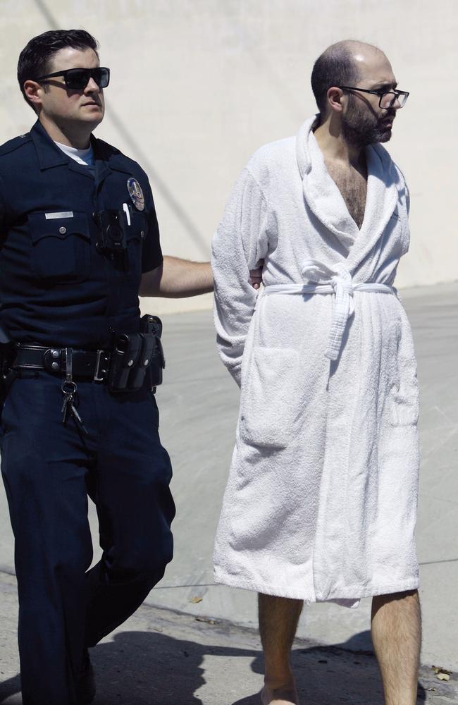 Richard appeared dishevelled wearing a robe while going barefoot. Picture: TheImageDirect.com