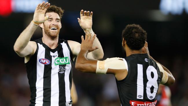 Tyson Goldsack and Travis Varcoe celebrate during the JLT Community Series. (Photo by Adam Trafford/AFL Media/Getty Images)