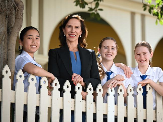 Brisbane Girls Grammar School principal Jacinda Welsh with Year 9 girls (from left) Karin Sagara, Zoe Pryor and Adelaide Morton. Picture: Lyndon Mechielsen