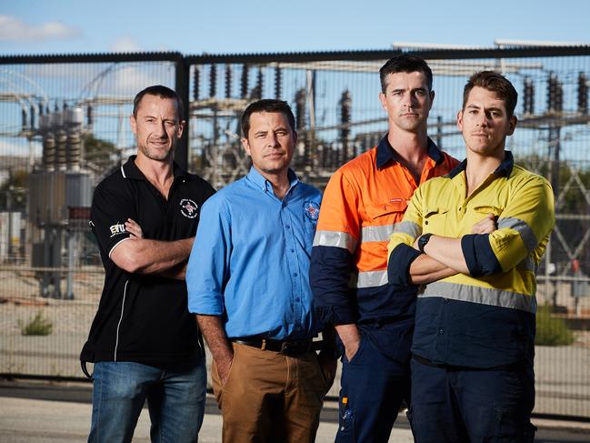 CEPU Officials Paul Scudds and John Adley with Electricians Greg Clift and Michael Wicht pose for a picture in Richmond, after not being paid by their former employer, Go Wasp for electrical work, Friday, Feb. 16, 2018. (AAP Image/MATT LOXTON)