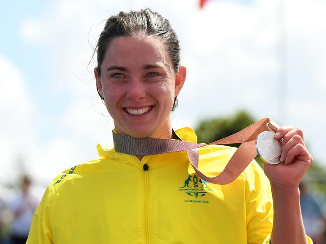 Silver medalist Emily Tapp of Australia during the medal ceremony for the women's PTWC Final on day three of the the XXI Commonwealth Games on the Gold Coast, Australia, Saturday, April 7, 2018. (AAP Image/Dean Lewins) NO ARCHIVING, EDITORIAL USE ONLY