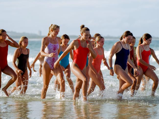 Ironwomen Harriet Brown and Lizzie Welborn with junior female athletes. Picture: Supplied.