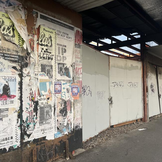 Parks of the market site are covered in graffiti and advertising. Picture: Nilsson Jones