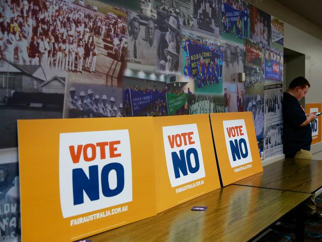 NEWCASTLE, AUSTRALIA - OCTOBER 05: A man looks on his mobile phone during 'Tony Abbot - Vote No Hunter Region' event at Raymond Terrace Bowling Club on October 05, 2023 in Newcastle, Australia. A referendum for Australians to decide on an indigenous voice to parliament will be held on October 14, 2023 and compels all Australians to vote by law. Early voting began on Oct. 2, with voting getting underway in rural and regional Australia as well.  (Photo by Roni Bintang/Getty Images)