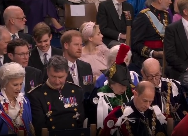 Prince Harry sat three rows back, behind the senior working royals, and largely blocked from view by Princess Anne’s hat. Picture: Sky News