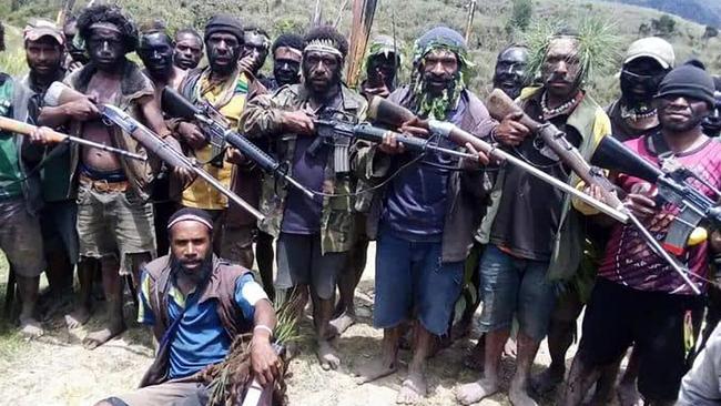 Tribal fighters in Papua New Guinea's Enga Province show of their strength, armed with military-style rifles.