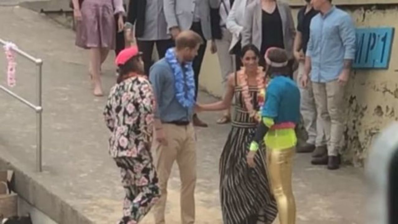 Harry and Meghan Remove Shoes at Bondi Beach