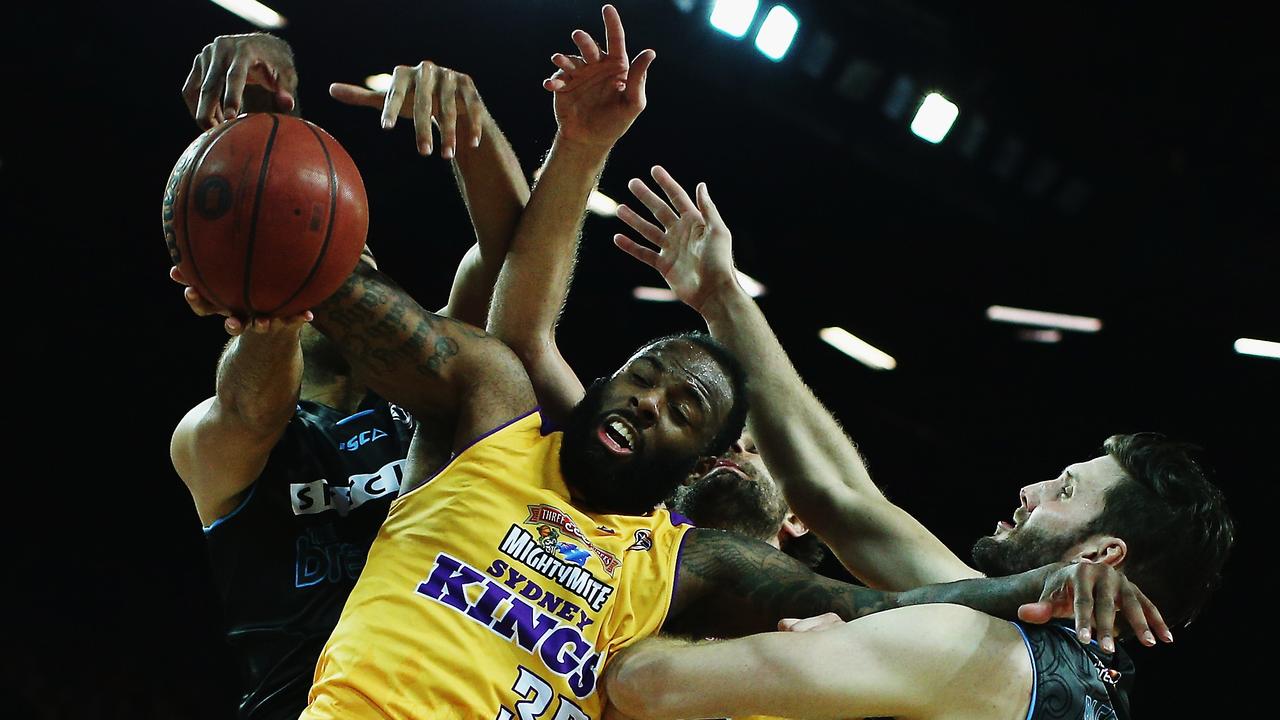 AUCKLAND, NEW ZEALAND - DECEMBER 11: Damion James of the Kings is blocked by Tai Wesley of the Breakers and Alex Pledger of the Breakers during the round 10 NBL match between the New Zealand Breakers and the Sydney Kings at Vector Arena on December 11, 2015 in Auckland, New Zealand. (Photo by Hannah Peters/Getty Images)