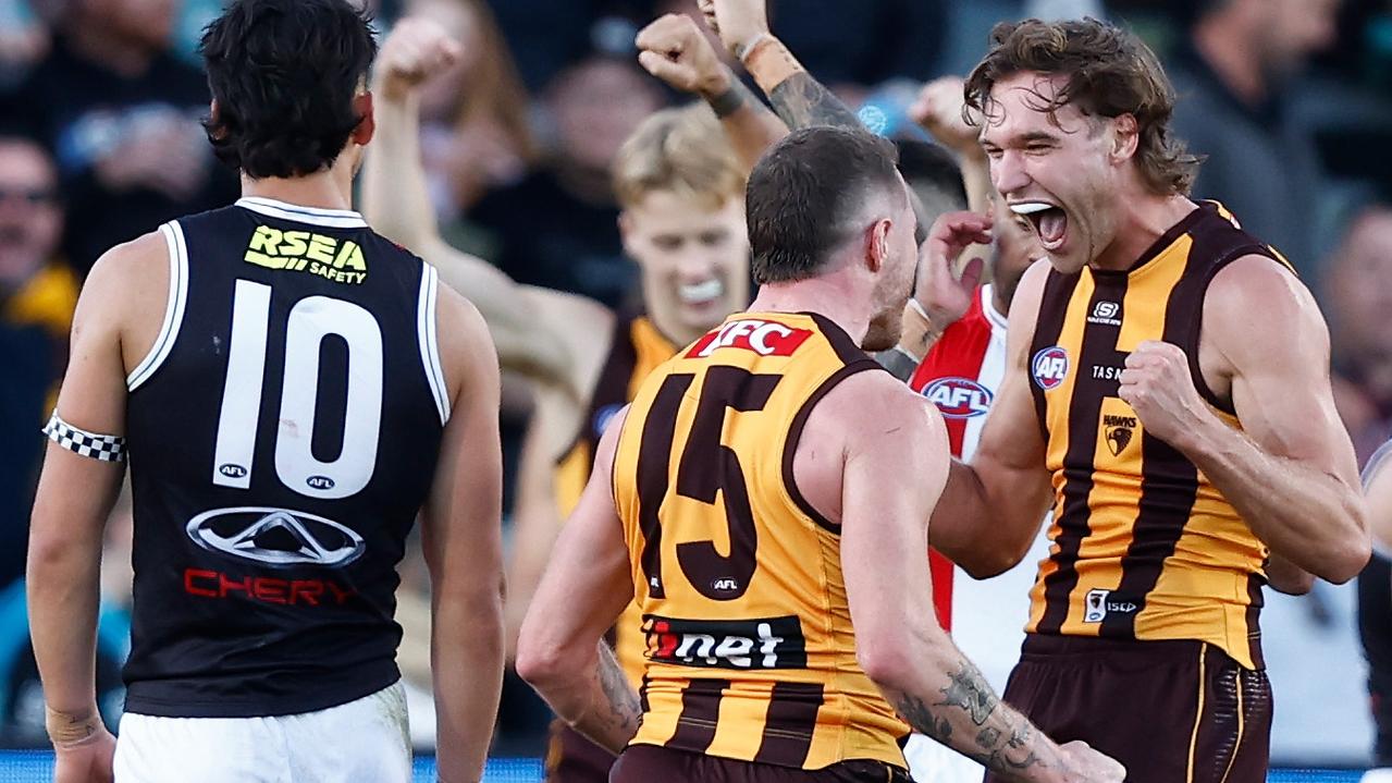 Jack Scrimshaw (15) and Blake Hardwick (right) celebrate during Hawthorn’s upset victory. (Photo by Michael Willson/AFL Photos via Getty Images)