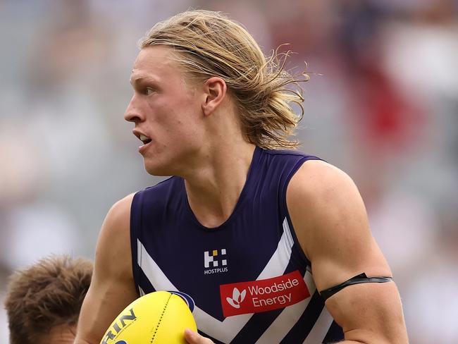 PERTH, AUSTRALIA - MARCH 17: Hayden Young of the Dockers in action during the round one AFL match between Fremantle Dockers and Brisbane Lions at Optus Stadium, on March 17, 2024, in Perth, Australia. (Photo by Paul Kane/Getty Images)