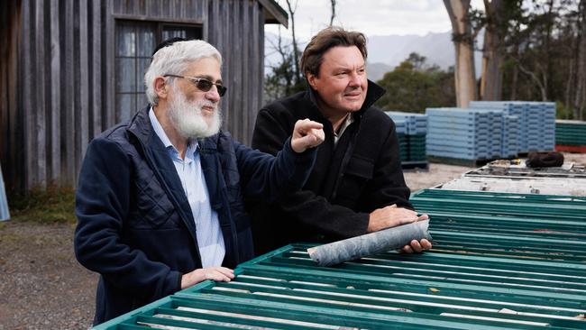 Joseph Gutnick, left, examines ore samples with senior geologist Mike Blake at Mazel Resources’ mining lease at Moina in Tasmania. Picture: Peter Mathew