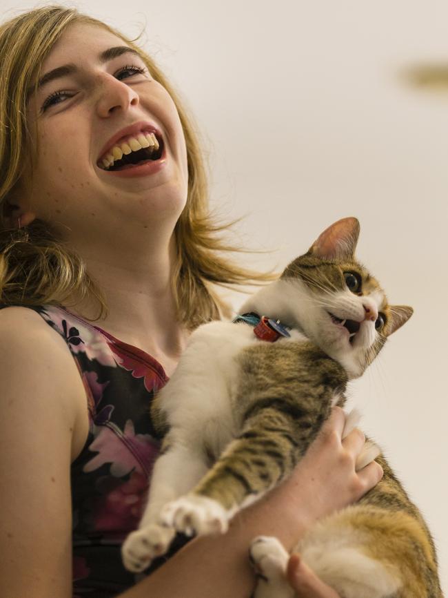 Transgender teen Georgie Stone, and her cat Joy, has thrown her support behind the Pride Centre. Picture: Valeriu Campan