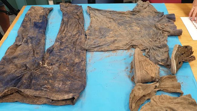 Clothes, shoes and a leg plate were found near the human remains off Keefton Road on the outskirts of Gympie.