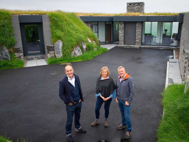 Kevin McCloud visits a build in Galloway, where they spent 250,000 pounds on a two-bedroom, glass-fronted, earth-sheltered home. But construction is on an exposed site, just feet from the cliff edge.