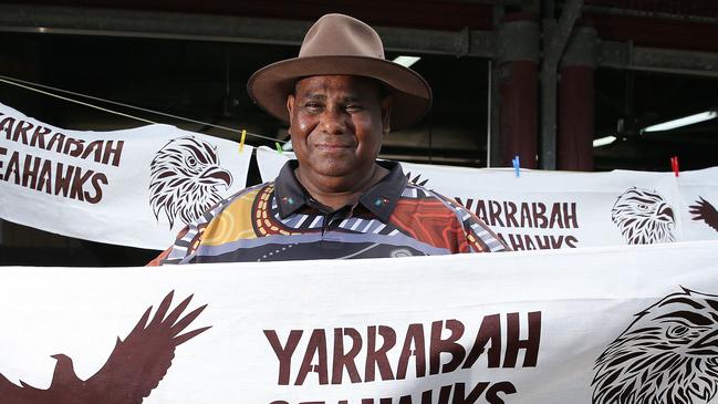 Yarrabah mayor Ross Andrews proudly flies a Seahawks supporter banner at the Yarrabah Arts Centre. Picture: Brendan Radke