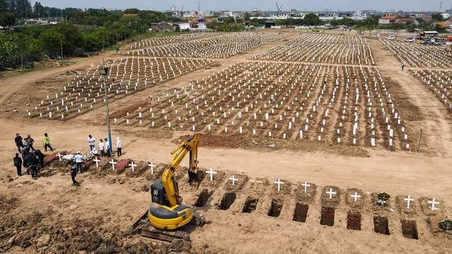 The graves of victims of the Covid-19 coronavirus at the Rorotan cemetery in Jakarta. Picture: AFP