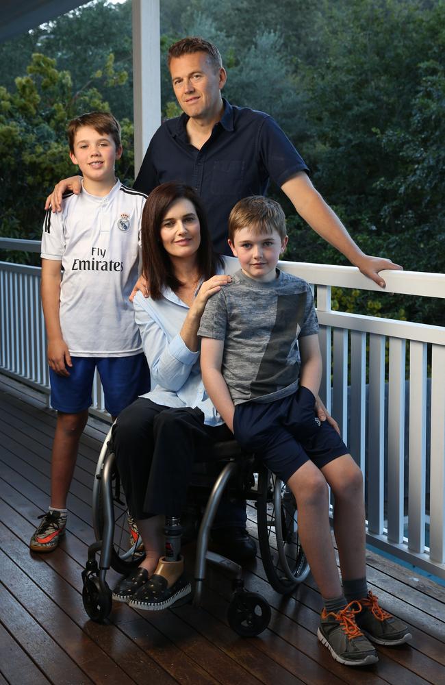 Ali France at home with her husband Clive and children Henry, 12, and Zac, 10. Picture: David Kelly