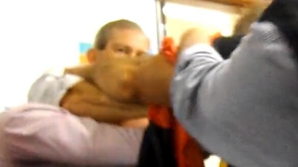 Mayor Mick Curran captured during the melee at Gympie council’s Mary St office in 2016..