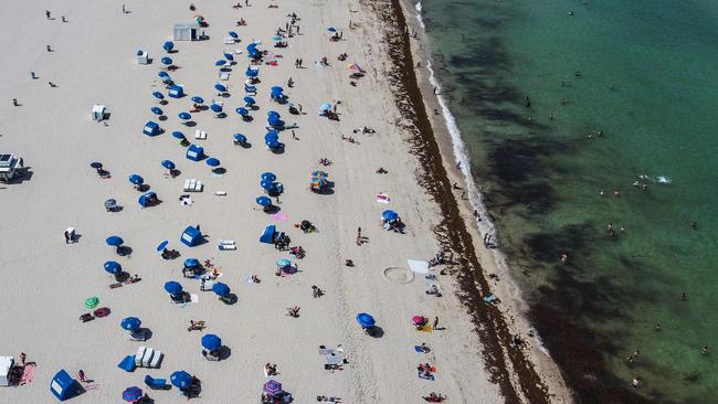 Beachgoers at Miami Beach, Florida. Picture: AFP.