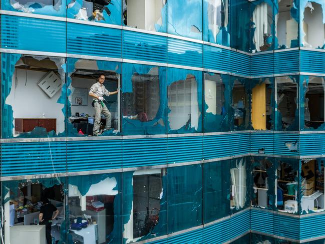 HONG KONG, HONG KONG - SEPTEMBER 17: The aftermath of Typhoon Mangkhut on September 17, 2018 in Hong Kong, Hong Kong. City officials raised the storm alert to T10, it's highest level, as Typhoon Mangkhut landed on Hong Kong. The strongest tropical storm of the season so far with winds as fast as 200 kilometres per hour, Mangkhut has reportedly killed at least 25 people in the Philippines as it continues it's path towards southern China. (Photo by Lam Yik Fei/Getty Images) *** BESTPIX ***