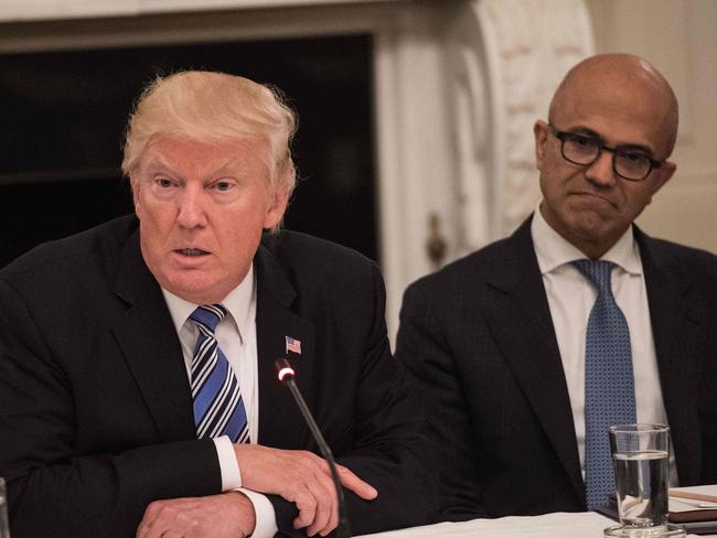 Microsoft CEO Satya Nadella (right) joins US President Donald Trump (left) at an American Technology Council roundtable at the White House on June 19, 2017. Picture: AFP/Nicholas Kamm