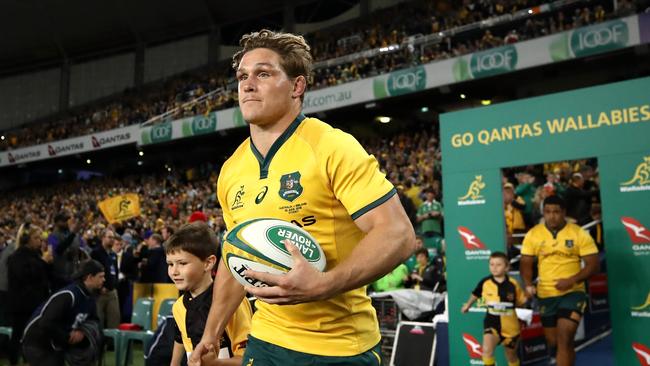 Michael Hooper of the Wallabies leads his team onto the field during the Third International Test match between the Australian Wallabies and Ireland at Allianz Stadium. Picture: Cameron Spencer/Getty Images)