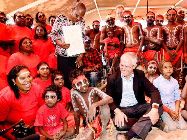 Prime Minister Malcolm Turnbull Election 2016. PM Malcolm Turnbull, traditional owner Raylene Singh and the Kenbi dancers in the electorate of Solomon, Darwin attending the Kenbi Land Claim Title Deed Handover at Wagait beach, Mandorah.