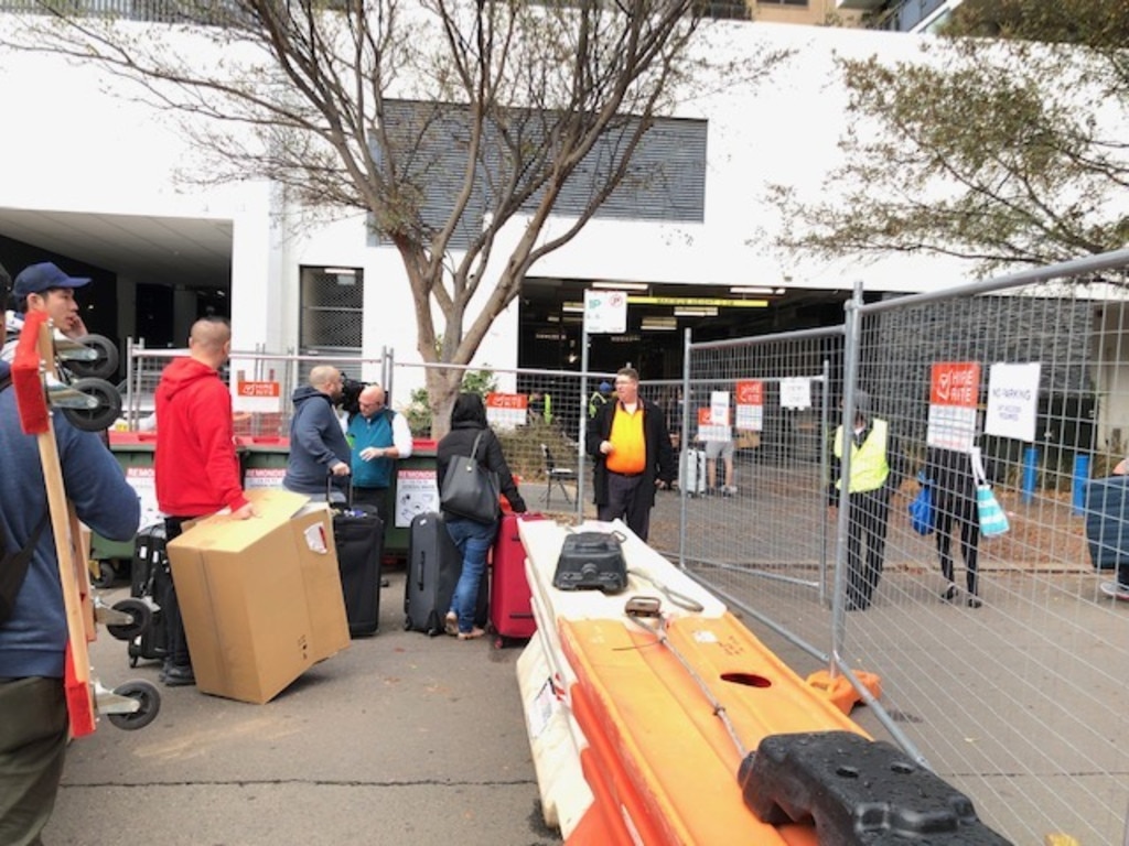 Residents wait to gain access this morning. Picture: Phoebe Loomes