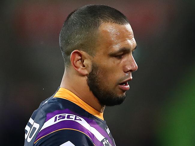 MELBOURNE, AUSTRALIA - SEPTEMBER 21: Nelson Asofa-Solomona of the Storm celebrates his try with Justin Olam of the Storm and Will Chambers of the Storm during the NRL Semi Final match between the Melbourne Storm and the Parramatta Eels at AAMI Park on September 21, 2019 in Melbourne, Australia. (Photo by Kelly Defina/Getty Images)