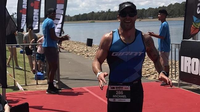 Former NRL star Michael Ennis completes his first ironman.