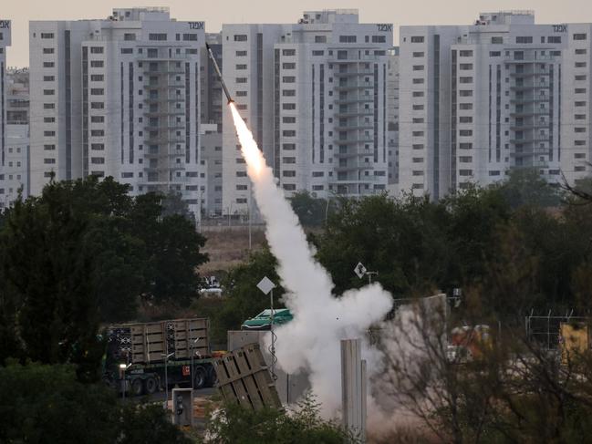 Israeli forces fire a rocket from their Iron Dome defence system in the southern city of Ashkelon to intercept rockets launched from the Gaza Strip in May. Picture: Ronaldo Schemidt/AFP