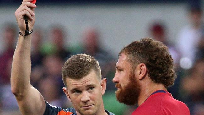 Reds captain Scott Higginbotham is sent off nine minutes into the match against the Rebels.