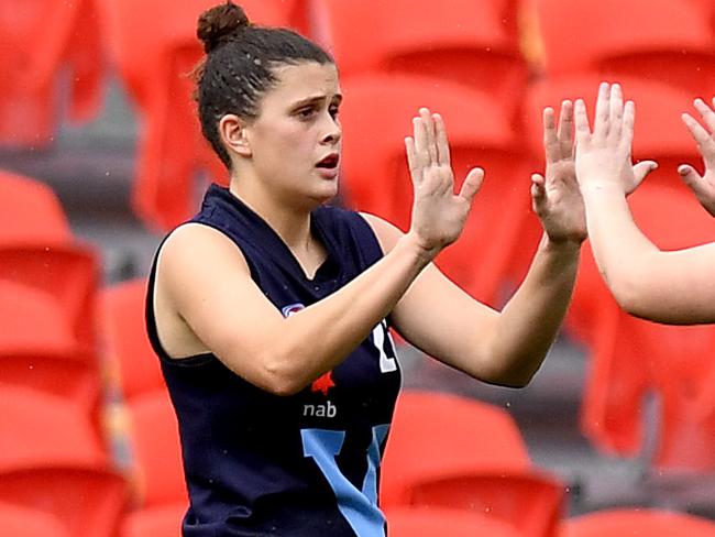 GOLD COAST, AUSTRALIA - JULY 08: Nell Morris-Dalton (L) of Vic Metro celebrates kicking a goal during the 2019 NAB AFLW Under 18 Championships match between Vic Metro and Western Australia at Metricon Stadium on July 08, 2019 in Gold Coast, Australia. (Photo by Bradley Kanaris/AFL Photos/via Getty Images)