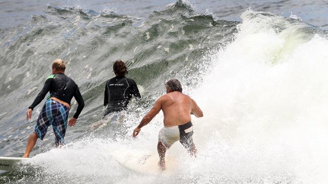 Crowded breaks have been tipped as the first summer swell arrives.