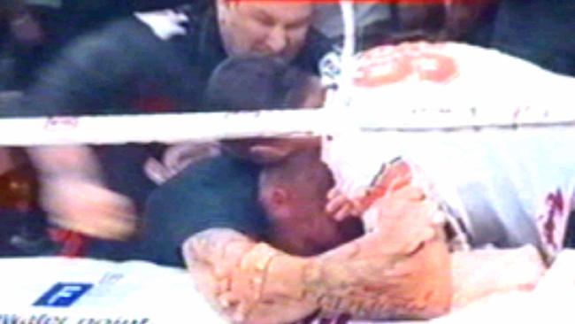 Christopher Hudson under attack during the infamous brawl between Hells Angels and Finks motorcycle gangs during a kickboxing event at Royal Pines Resort. Picture: Channel 7