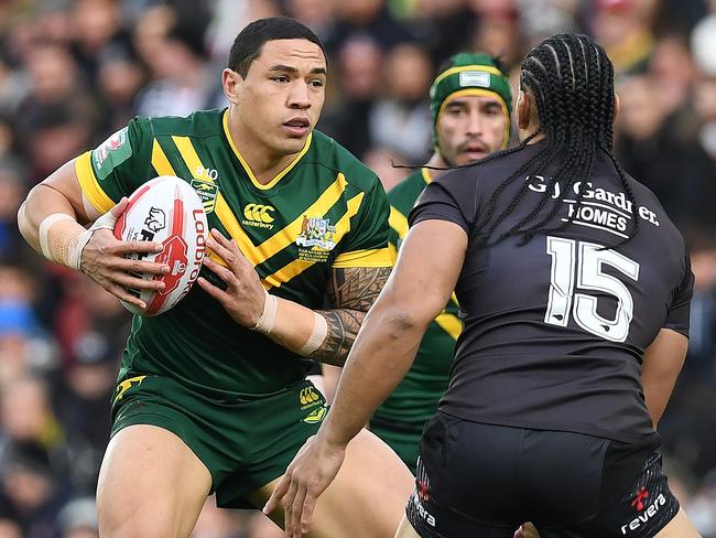 Australia's Tyson Frizell runs into New Zealand's Martin Taupau during the Four Nations final at Liverpool in November. Picture: AFP