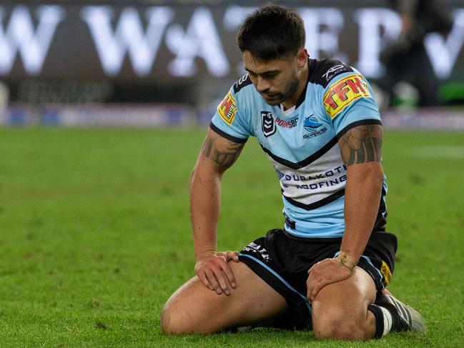 Shaun Johnson of the Sharks kicks the ball out on the full during the Round 15 NRL match between the Canterbury Bulldogs and the Cronulla Sharks at ANZ Stadium in Sydney, Sunday, June 30, 2019. (AAP Image/Steve Christo) NO ARCHIVING, EDITORIAL USE ONLY