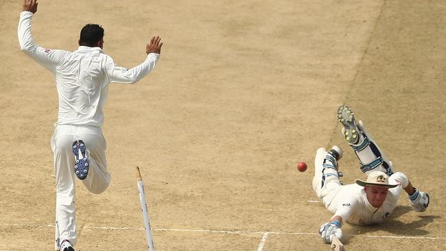 Australian batsman Peter Handscomb is run out for 82 on Wednesday.